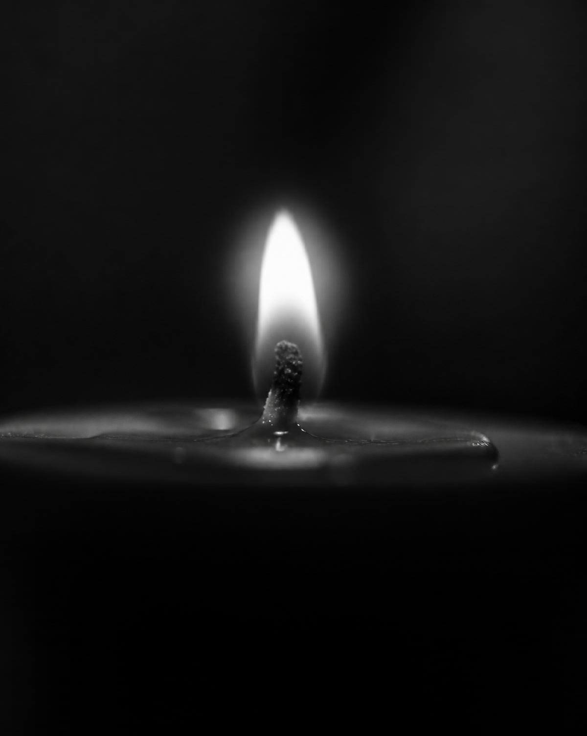 A single wick catching light